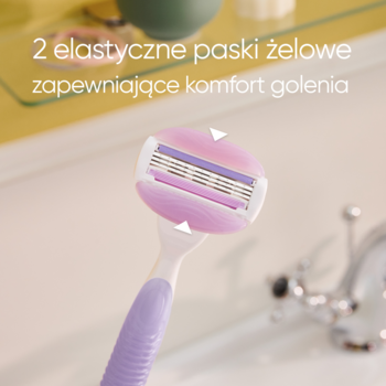 Gillette Venus Comfortglide Breeze, zbliżenie na głowicę maszynki z 3 ostrzami i 2 fioletowymi paskami żelowymi dla komfortu.