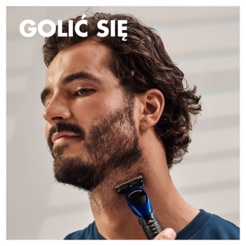 Mężczyzna z zarostem używa niebieskiej maszynki Gillette Styler 4w1 do golenia karku. Technologia Braun.