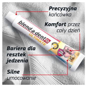 Biała tubka Blend-a-dent Ultimate kremu do protez. Podkreślone cechy: precyzyjna końcówka, komfort i silne mocowanie.