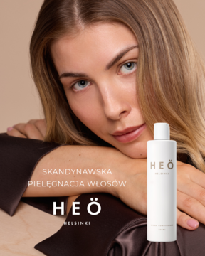 Heö Helsinki Hydra nawilżająca odżywka do włosów farbowanych, biała butelka obok modelki.