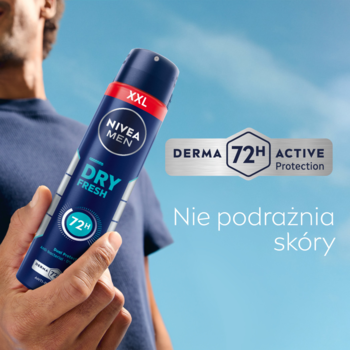 Męski antyperspirant NIVEA MEN Dry Fresh 72h, niebiesko-srebrny spray, nie podrażnia skóry, trzymany na tle nieba.
