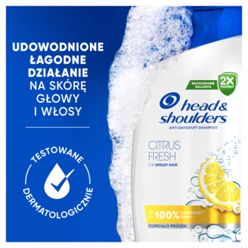 Szampon Head & Shoulders Citrus Fresh, biała butelka z cytryną, piana. Napisy: łagodne działanie na skórę, testowany dermatologicznie.