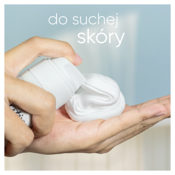Dłoń wyciska białą, kremową piankę żelu Satin Care Dry Skin z butelki. Tekst: do suchej skóry.