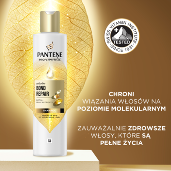 Szampon Pantene Molecular Bond Repair z biotyną w białej butelce ze złotymi detalami, widok z przodu na złotym tle.