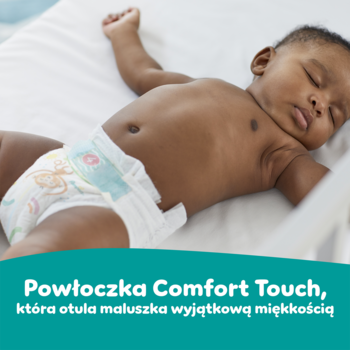 Śpiące dziecko w Pampers Active Baby 3. Widoczny napis Comfort Touch o miękkości pieluszki (6-10kg).