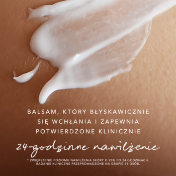 Zbliżenie na biały balsam do ciała MEXX Inspired Warmth, gładko rozprowadzony na skórze, szybko się wchłania.