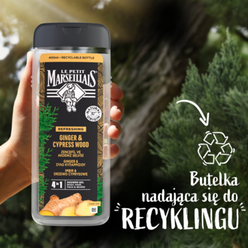 Le Petit Marseillais żel 3w1 Imbir&Cyprys, czarna butelka, ręka trzymająca na tle zieleni, symbol recyklingu.