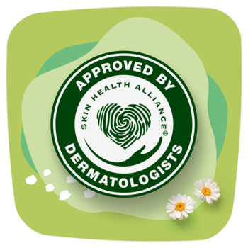 Zielone logo "APPROVED BY DERMATOLOGISTS" z sercem-odciskiem palca, otoczone rumiankami. Certyfikat.