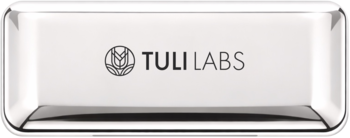 Elegancki, srebrny kompakt Tuli Labs z logo i napisem 'TULI LABS', widok z góry, błyszczące wykończenie.