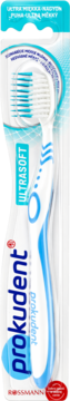 Prokudent Ultrasoft szczoteczka do zębów z włóknami X, biało-niebieska, w przezroczystym opakowaniu, widok z przodu.
