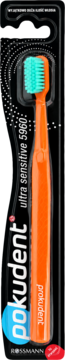 Prokudent Ultra Sensitive 5960 szczoteczka do zębów, pomarańczowa z turkusowymi włóknami, w czarnym opakowaniu.