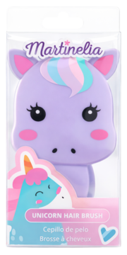Martinelia Unicorn Hair Brush: a light purple unicorn-shaped brush with rainbow mane, in clear packaging, frontal view.