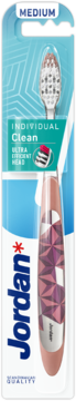 Szczoteczka do zębów Jordan Individual Clean Medium w opakowaniu, różowy uchwyt, ultra precyzyjna główka.