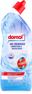 Domol WC-Reiniger Urinstein & Kalklöser, niebieski płyn w przezroczystej butelce z czerwoną nakrętką, widok z przodu.