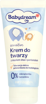 Babydream sensitive face cream in white tube, front view. Features blue logo, elephants, and Polish text on shea butter, panthenol, 0% microplastic.