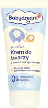Babydream sensitive face cream in white tube, front view. Features blue logo, elephants, and Polish text on shea butter, panthenol, 0% microplastic.