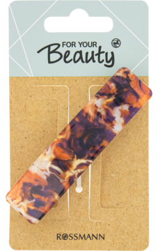 Klamra do włosów w marmurkowy wzór fioletowo-pomarańczowy, na brązowym kartoniku. Widok z przodu.