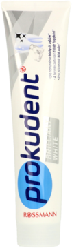 Biała tubka pasty do zębów Prokudent Brilliant White, widok z przodu, z niebieskimi literami i logo Rossmann.