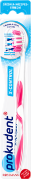Szczoteczka do zębów Prokudent X-Control średnia, biało-różowa, z ergonomiczną rączką, w opakowaniu, widok z przodu.