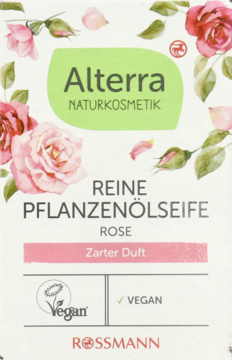 Alterra Naturkosmetik mydło roślinne Rose, białe opakowanie z różami i logo Rossmann, widok z przodu.