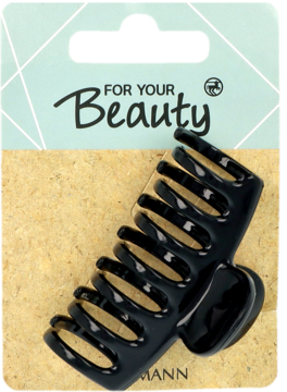 Ciemna, plastikowa klamra do włosów typu szczęka na beżowym kartoniku z napisem „FOR YOUR Beauty”, widok z przodu.