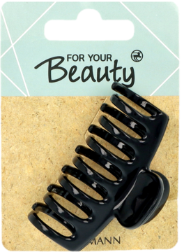 Ciemna, plastikowa klamra do włosów typu szczęka na beżowym kartoniku z napisem „FOR YOUR Beauty”, widok z przodu.
