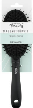 Czarna szczotka masująca For Your Beauty Rossmann, z elastycznymi ząbkami, na opakowaniu, widok z przodu.