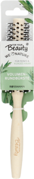 For your Beauty Rossmann Volumen-Rundbürste z jasną rączką, czarnym włosiem, w zielonym opakowaniu z listkami, widok z przodu.