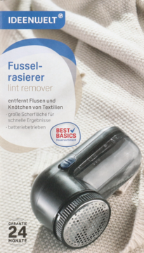 IDEENWELT ciemna golarka do ubrań, widok z przodu na białym swetrze, z metalową głowicą do usuwania kłaczków.