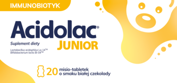 Acidolac Junior, 20 misio-tabletek o smaku białej czekolady. Białe opakowanie z żółtymi detalami i misiem.
