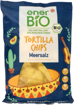 Paczka enerBio Tortilla Chips Meersalz, granatowa, z grafiką sombrero, awokado i kaktusa.