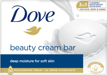 Biała kostka myjąca Dove Beauty Cream Bar na tle opakowania, z niebieskimi napisami i kremowym rozpryskiem.
