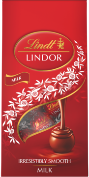 Czerwone pudełko Lindt Lindor Milk, z grafiką płynnej czekolady i widocznymi pralinami.