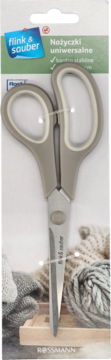 Nożyczki uniwersalne Flink & Sauber w opakowaniu, szare uchwyty, widok z przodu, na tle dzianiny.