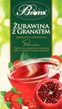 Zielone opakowanie herbatki BioFix żurawina z granatem, 20 saszetek. Z przodu filiżanka herbaty i owoce.