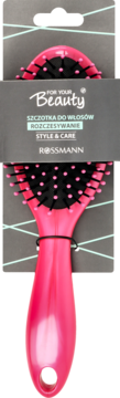 Różowa szczotka do włosów Rossmann For Your Beauty do rozczesywania, z czarnymi kolcami, na szarym tle.