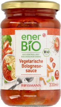 Słoik wegetariańskiego sosu Bolognese Enerbio 330 ml, przezroczysty, z zielono-białą etykietą, widok z przodu.