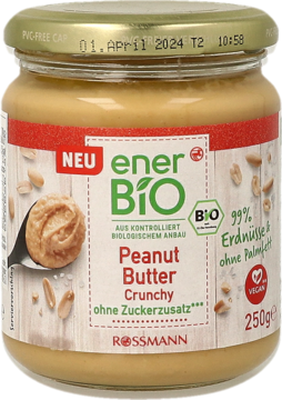 Słoik enerBIO Crunchy Peanut Butter (99% orzeszków) bez cukru i oleju palmowego. Na etykiecie łyżka z masłem.