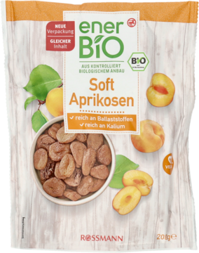 Opakowanie EnerBiO Soft Aprikosen, morele suszone BIO 200g, z owocami i liśćmi na drewnianym tle.