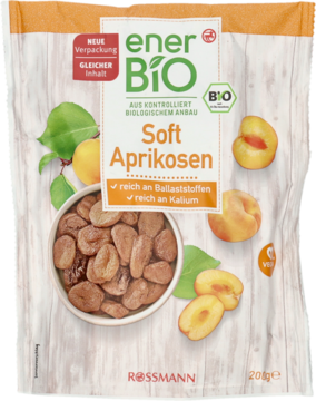 Opakowanie EnerBiO Soft Aprikosen, morele suszone BIO 200g, z owocami i liśćmi na drewnianym tle.