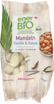 Ener BIO migdały w białej czekoladzie waniliowo-kokosowe 100g, przezroczysta torebka z palmą i owocami, widok z przodu.