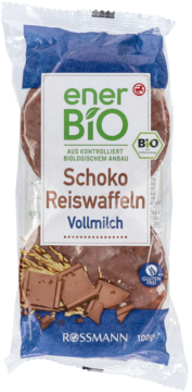 enerBio Schoko Reiswaffeln Vollmilch, przezroczyste opakowanie 100g, widok z przodu, bezglutenowe wafle ryżowe w mlecznej czekoladzie.