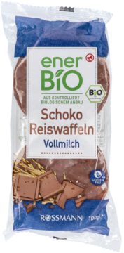 enerBio Schoko Reiswaffeln Vollmilch, przezroczyste opakowanie 100g, widok z przodu, bezglutenowe wafle ryżowe w mlecznej czekoladzie.