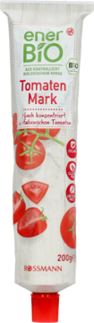 Biała tuba enerBiO Tomaten Mark 200g z włoskich pomidorów bio, z przodu widać pomidory.