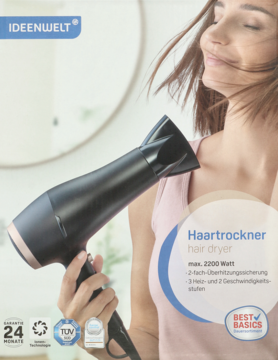 Czarny profesjonalny suszarka Ideenwelt z miedzianymi akcentami, trzymana przez kobietę. Widok z przodu opakowania produktu.