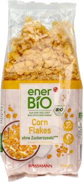 EnerBio Corn Flakes, bezglutenowe i wegańskie, w przezroczystej torebce z żółtą etykietą. Widok z przodu.