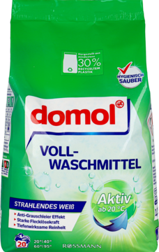Zielony worek Domol proszku do prania białego, z napisem "Aktiv ab 20°C" i bąbelkami, widok z przodu.