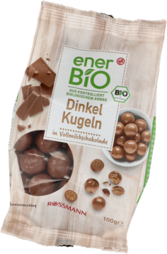 Biało-brązowe opakowanie EnerBiO Dinkel Kugeln 100g, orkiszowe kulki w mlecznej czekoladzie, widok z przodu.