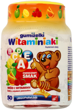 Biały słoik Gumiżelki Witaminiaki, owocowe żelki z miodem i witaminami, z uśmiechniętym misiem, widok z przodu.