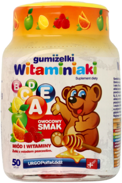 Biały słoik Gumiżelki Witaminiaki, owocowe żelki z miodem i witaminami, z uśmiechniętym misiem, widok z przodu.